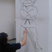 Naoki Urusawa en train de dessiner Jigorou Inokuma, le grand père de Yawara