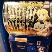 Les clés de Lucy Heartfillia dans les machines de gashapons